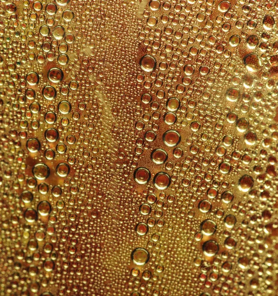 Condensação de água na superfície amarela — Fotografia de Stock