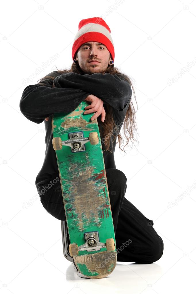 Skateboarder Posing With Board
