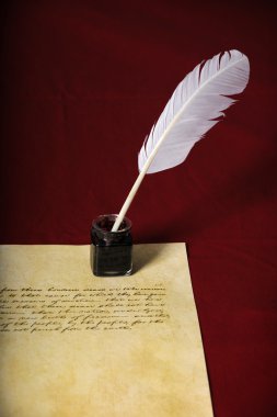 Quill'in ve kalem ile el yazısı metin