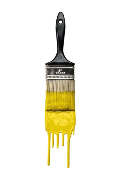 Pincel com tinta amarela — Fotografia de Stock