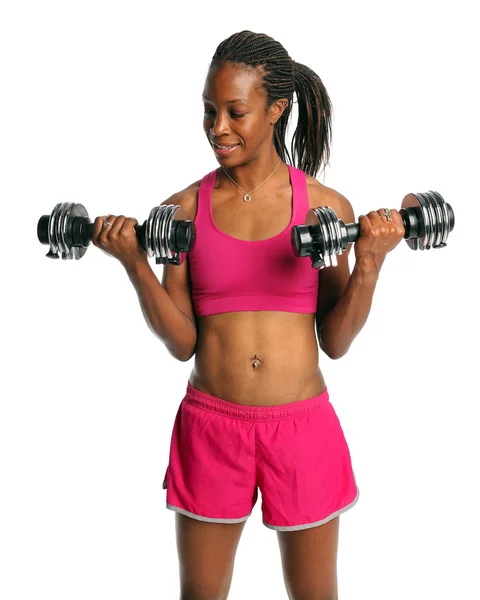 Mujer haciendo ejercicio con pesas — Foto de Stock