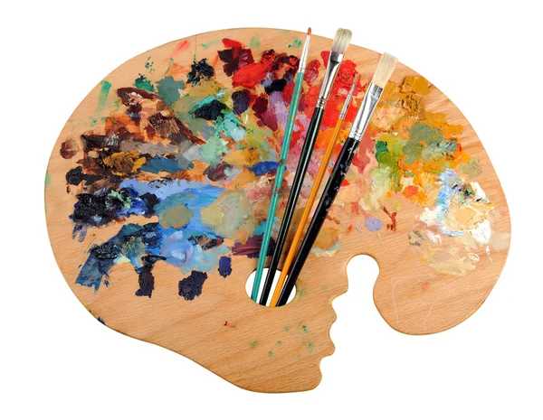 Konstnärens palett med penslar — Stockfoto