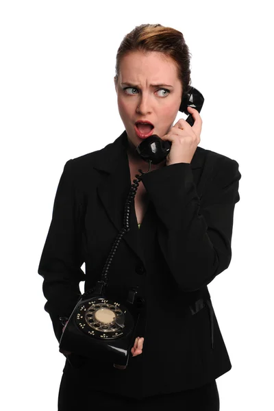 Бизнесмен, использующая винтажный телефон — стоковое фото