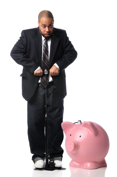 Empresário Inflando Piggy Bank — Fotografia de Stock