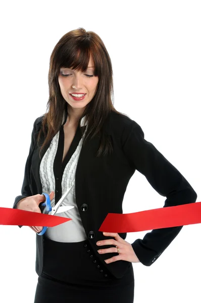Businesswoman Cutting Red Ribbon — Stockfoto