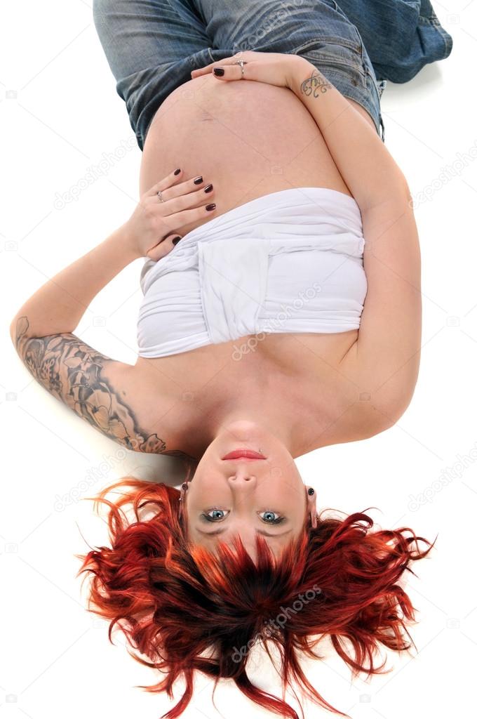 Pregnant Woman Laying on Floor