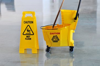 Mop, Bucket and Caution Wet Floor clipart