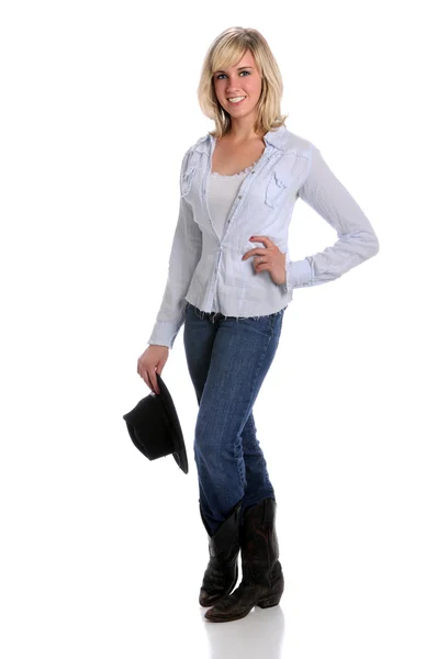 Jonge vrouw in veedrijfster outfit — Stockfoto