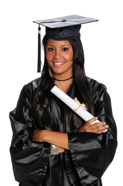 Jovem mulher vestida em vestido de graduação e Mortarboard — Fotografia de Stock
