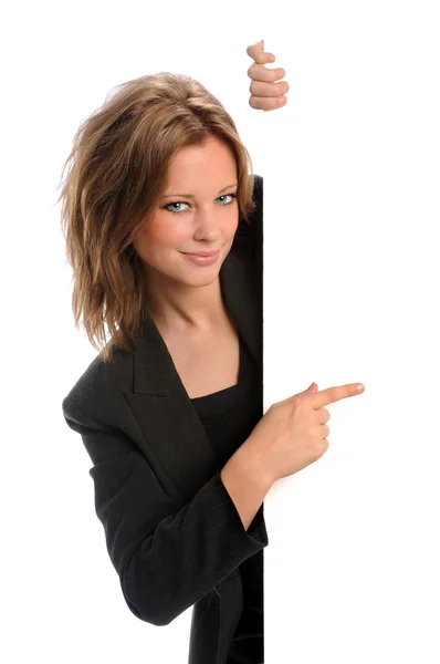 Businesswoman Pointing to Blank Sign — Stock Photo, Image