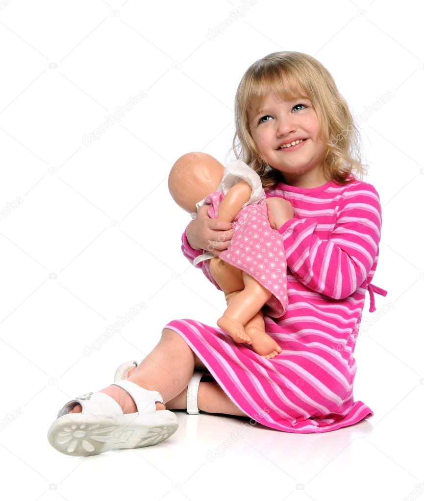 Young Girl Playing with Doll
