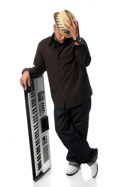 Young Man Posing Alongside Electric Piano — Stock Photo, Image