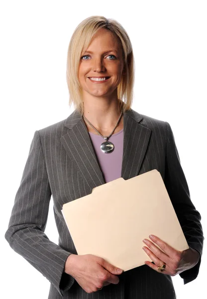 Бізнес-леді тримає файл посміхаючись — стокове фото