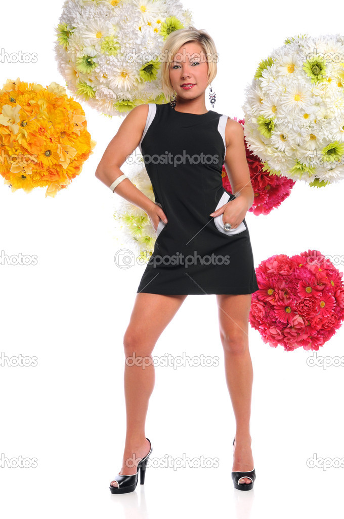 Woman Standing Over Flower Arrangements