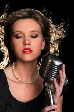 Woman With a Vintage Microphone