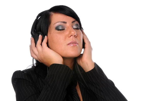 Kvinna med hörlurar — Stockfoto