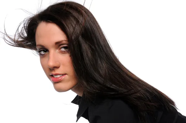 Saç üfleme ile genç bir kadın — Stok fotoğraf