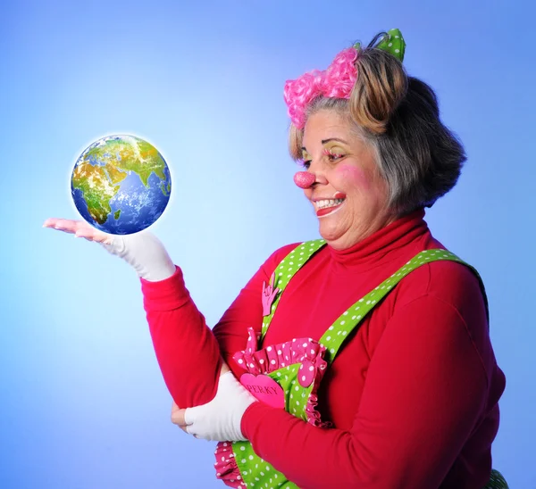 Clown Holding Earth in Hand — Stock Photo, Image