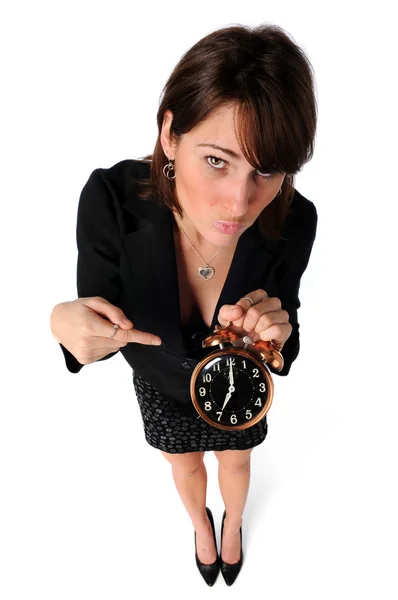 Femme d'affaires pointant vers Horloge — Photo