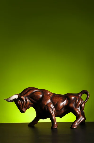 Bull Figure over a green Background — Stock Photo, Image