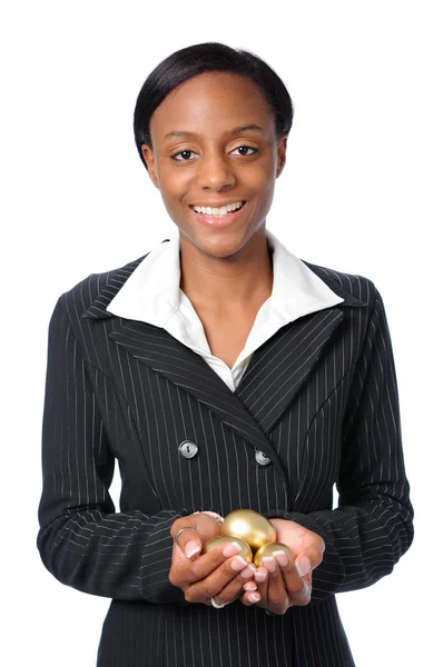 Woman Holding Gold Eggs — Stock Photo, Image