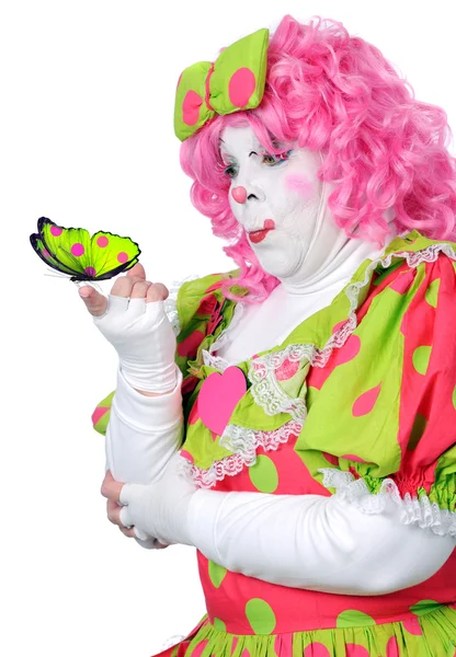 Clown förvånad över buttefly — Stockfoto