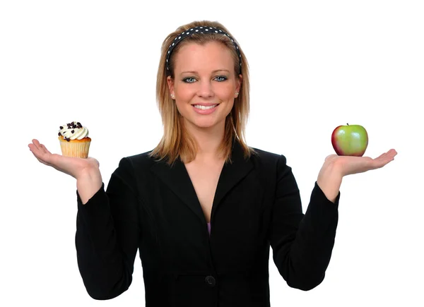 Woman Holding Cup Cake and Apple — Stock Photo, Image