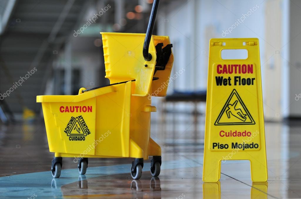 Mop, Bucket and Caution Wet Floor Stock Photo - Image of spanish