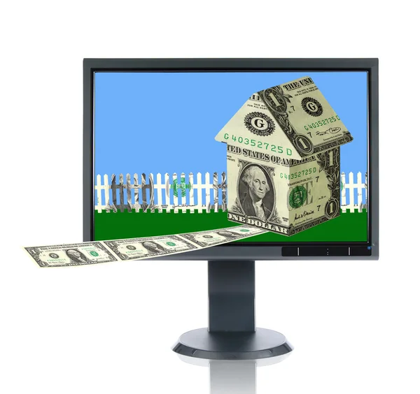 LCD-monitor en huis eigendom — Stockfoto