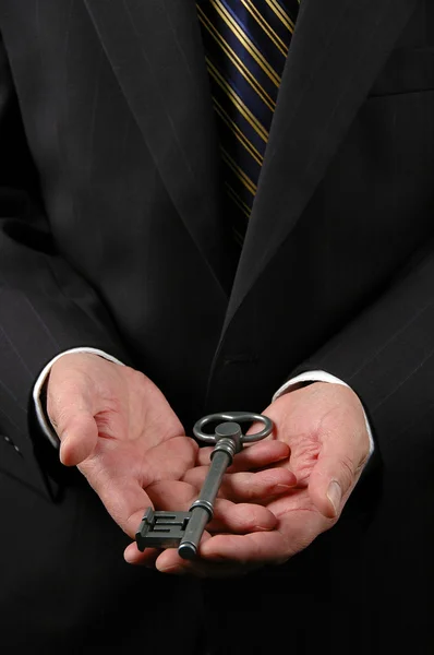 Hands Holding Key — Stock Photo, Image