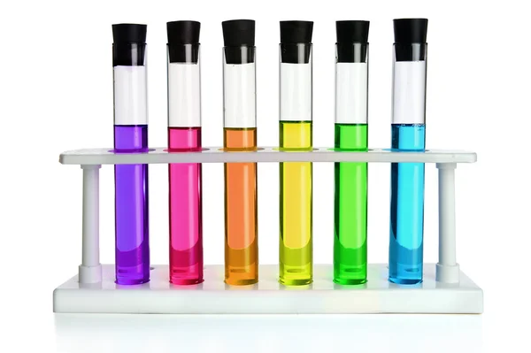 Farbige Flüssigkeiten in sechs Reagenzgläsern — Stockfoto