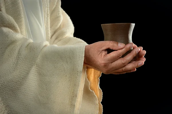 Jesushände mit Becher — Stockfoto