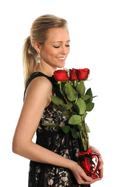 Vrouw met boeket van rode rozen — Stockfoto