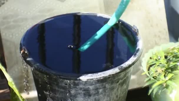 Water Spills Black Bucket Video Full Does Fit Anymore Overload — Stockvideo