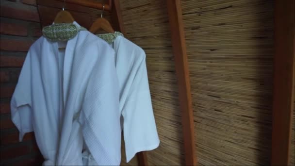 White Pajamas Hanging Corner Villa Video — Vídeo de Stock