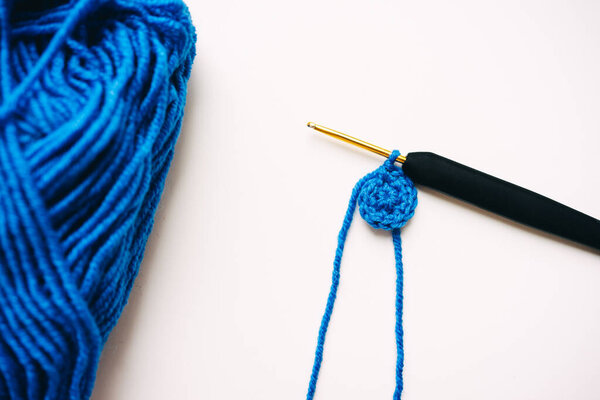 step-by-step master class on crocheting a two-color heart. step 1. High quality photo