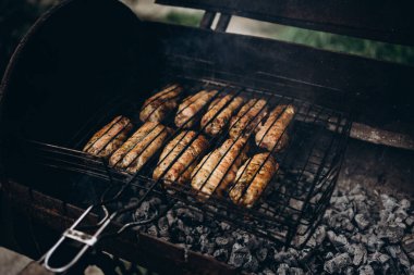 Dinner party, barbecue and roast pork at night. High quality photo