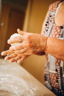 Making dough by male hands at bakery. Food concept. High quality photo