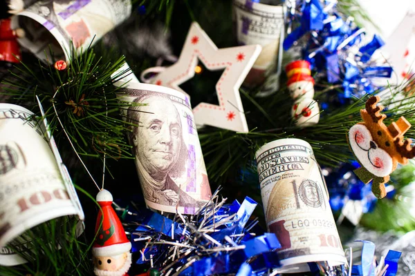Dollar Bills Hanging Christmas Tree Alongside Traditional Christmas Decorations — Stock Photo, Image