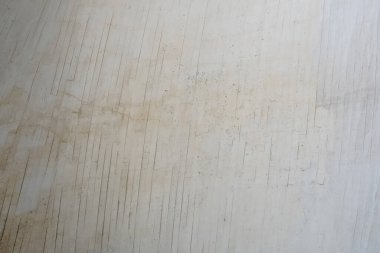 Saf ve sert beton bir duvarın dokusunda izler var..