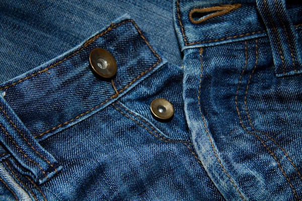 Закрыть синие джинсы с кнопками — стоковое фото
