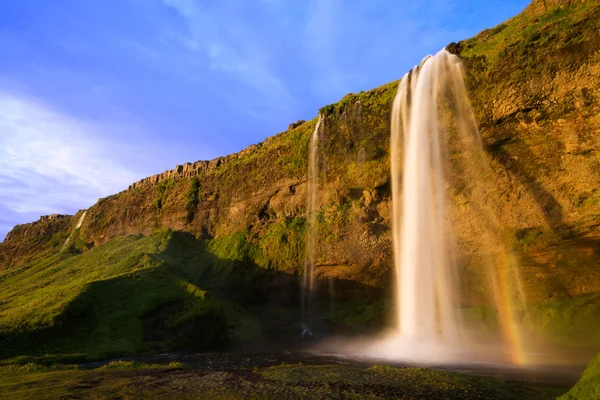 Cachoeira Seljalandfoss ao pôr do sol, Islândia — Fotografia de Stock