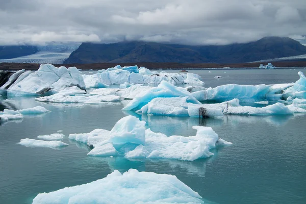 Icebergs on Jokulsarlon glacier lagoon, Iceland Stok Resim