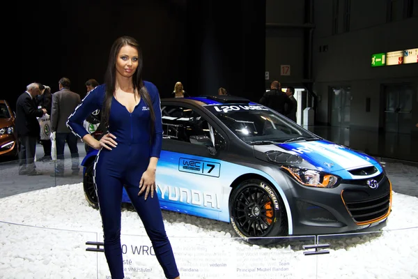 Hostess with Hyundai i20 WRC on display at the 11th edition of International Autosalon Brno — Stock Photo, Image