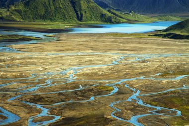 Wild river delta with mountains, Iceland clipart