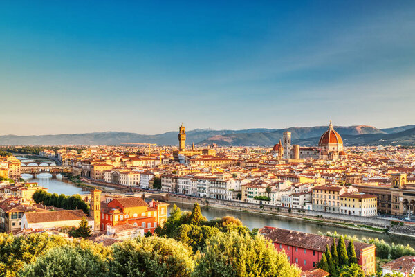 Florence Aerial View at Sunrise over Ponte Vecchio Bridge, Palazzo Vecchio and Cathedral of Santa Maria del Fiore with Duomo, Italy