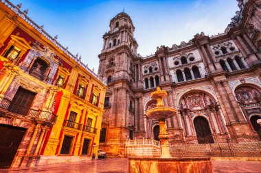 Illuminated Malaga Cathedral from Plaza Del Obispo at Dusk in Malaga, Andalusia, Spain 