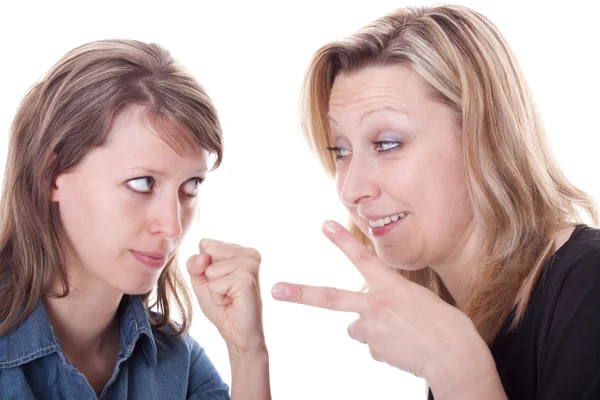 Two young woman are playing a game — Stock Photo, Image