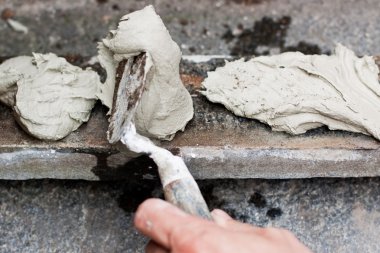 Craftsman carries on glue on riser
