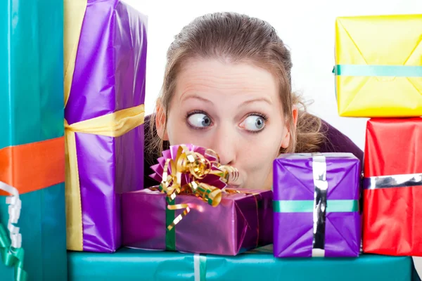 Young attractive woman with gifts — Stock Photo, Image